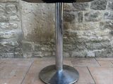 an image of a table with a sign on it