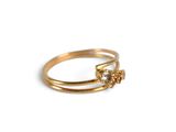 an image of a gold ring on a white background