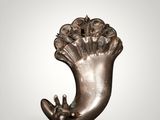 a close up of a metal object on a white background