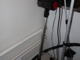 a picture of a room with a vacuum and other items