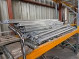 a large metal rack with a bunch of metal items on it