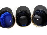 three hats that are sitting next to each other