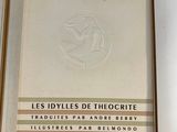 an open book with a picture of a bird on the cover