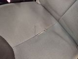 a car that has a seat belt that has a hole in it