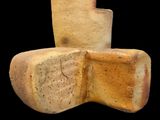 two pieces of pottery that are stacked on top of each other