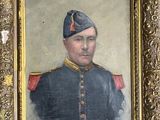 portrait d'un homme en uniforme militaire dans un cadre doré