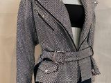 an image of a mannequin wearing a jacket and leggings
