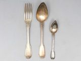 three silver spoons and two silver spoons next to each other