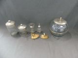 a lot of glass items that are on a table