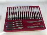 a red box with a set of silverware in it