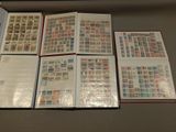 many different types of stamps on the pages of a book