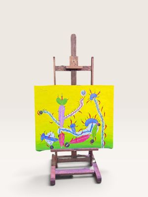 un petit chevalet sur lequel est posé un tableau, sur fond blanc