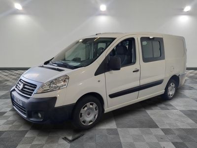 a picture of a white van parked in a room