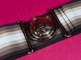 a watch that is sitting on top of a belt