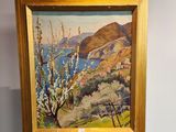 une peinture à l'huile représentant un tableau représentant un paysage avec des montagnes en arrière-plan