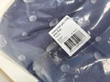 a plastic bag with a blue polka dot pattern on it