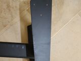 an overhead view of a chair and a table in a room