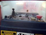 a close up of a machine with a lot of screws on it