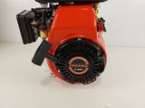 an image of a small engine sitting on top of a table
