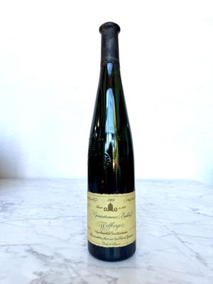 a bottle of wine that is sitting on a table