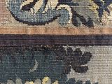 an image of a close up of a rug with flowers on it