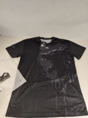 the shirt is black and white with a picture of a cat on it