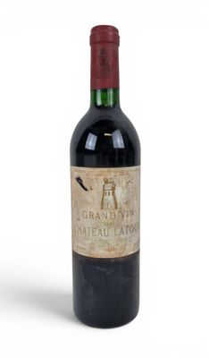 a bottle of wine that is sitting on a table