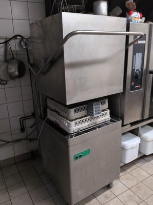 an image of a commercial kitchen with stainless steel appliances