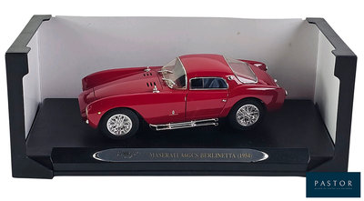 a red model of a car in a display case