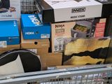 a shopping cart filled with boxes and other items