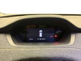 a picture of a car dashboard with a digital display