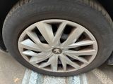 a close up of a tire on a car ' s rim