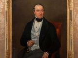painting of a man in a suit and bow tie sitting in a chair