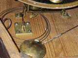 a clock that is sitting on a wooden table