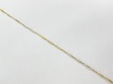 a gold and silver necklace with a long chain on a white background