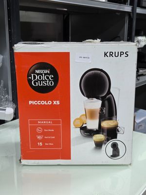 emballage d'une machine à café posée sur le comptoir d'un magasin