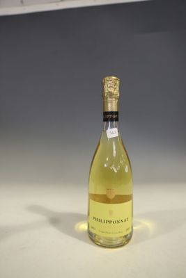 a bottle of wine that is sitting on a table