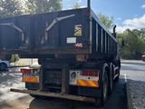 a truck that is parked on the side of the road