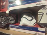 a star wars stormtrooper helmet on display in a store