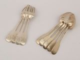 two spoons and a fork on a white surface