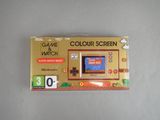 an image of a nintendo game console with a yellow screen
