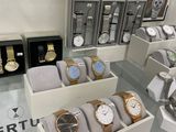 a lot of watches on display in a store