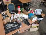 a desk with a lot of items on it