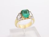 an emerald and diamond ring