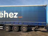 a semi truck that is parked in a parking lot