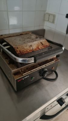 a toaster that is sitting on top of a counter