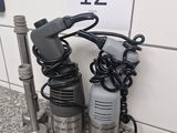 two different types of hair dryers sitting on a counter