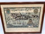 une vieille carte de Saint-Malo, encadrée dans un cadre en bois, accrochée au mur