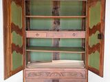 an image of a wooden cabinet with two doors open on a white background