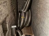 an image of a room that has a bunch of pipes in it